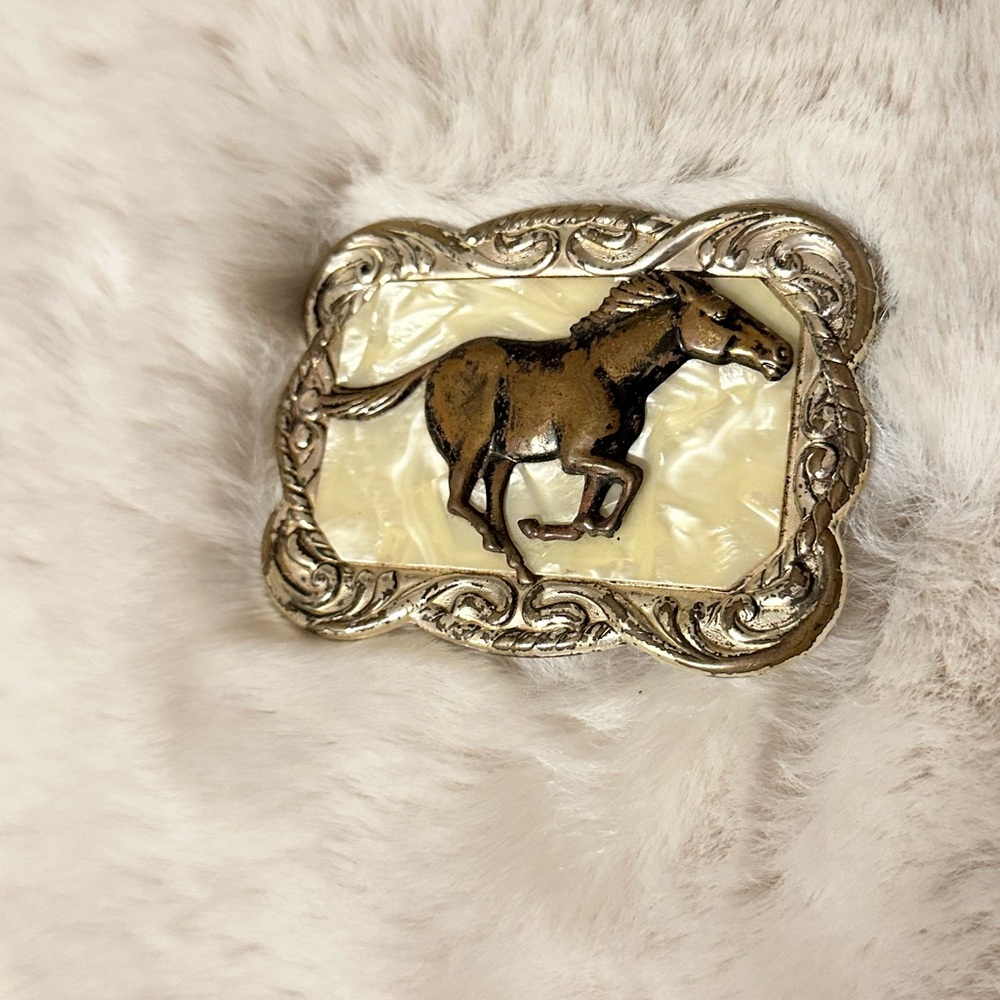 Horse Motif Silver & Cream Belt buckle, 2”x3”, see pictures for damage details.